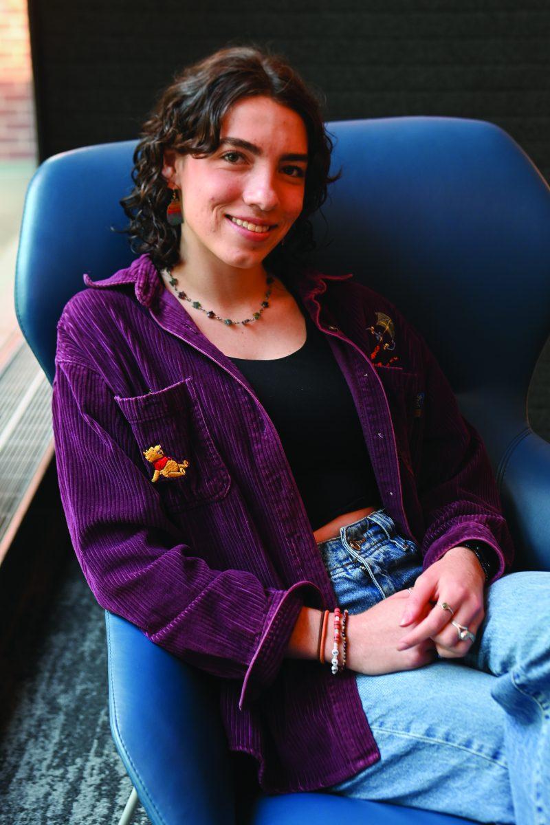 Salia Buser, a third-year studying political science and international studies, sits for a portrait in Caldwell Lounge on Monday, Oct. 7, 2024. Salia was interviewed as a part of Technician&#8217;s &#8220;Portraits of the Pack&#8221; series, in which students were asked questions regarding their political views.&#160;&#160;