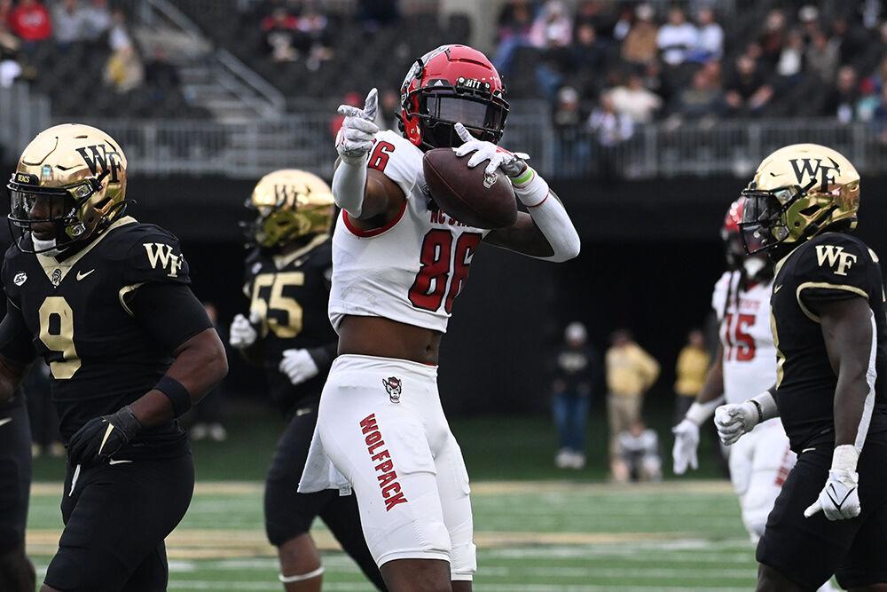 Redshirt sophomore wide receiver Decari Collins points for a first down during the game against the Wake Forest Demon Deacons in Allegacy Federal Credit Union Stadium on Saturday, Nov. 11, 2023. Collins caught for 38 yards. The Wolfpack beat the Demon Deacons 26-6.