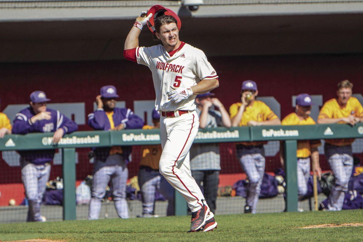 Junior catcher Patrick Bailey walks to home plate after another player hit a home run against Tennessee Tech in Doak Field at Dail Park on Sunday, Feb. 23, 2020. Bailey had two runs during the game.