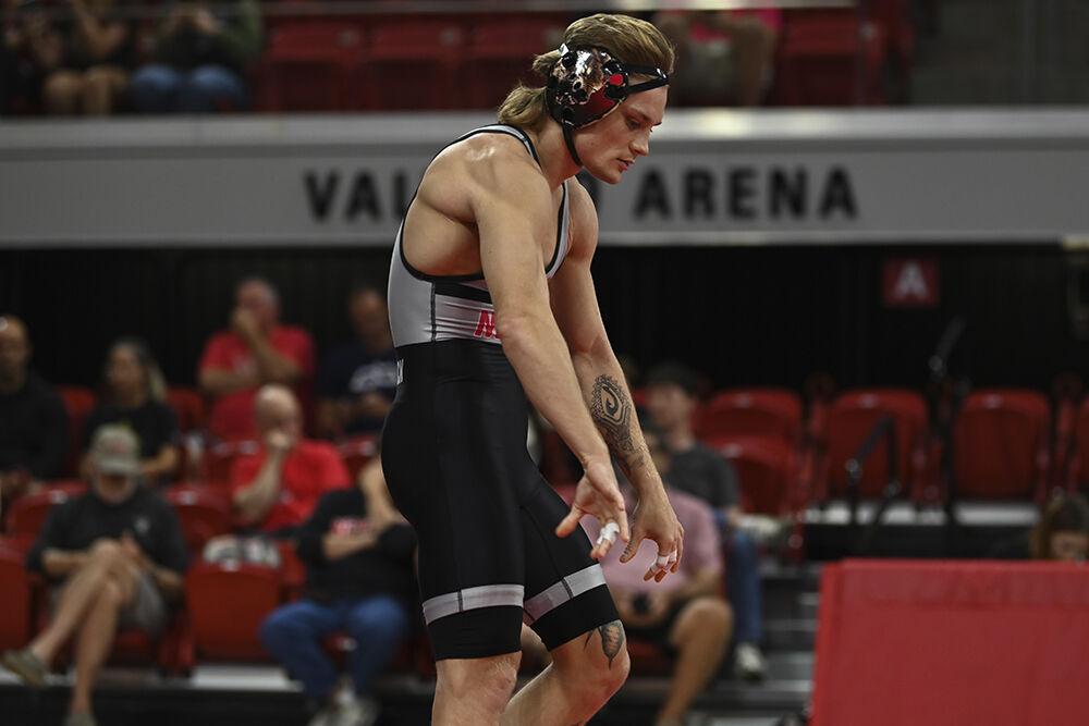 Redshirt senior Kai Orine celebrating during the Wrestle-Offs in Reynolds Coliseum on Saturday, Oct. 26, 2024. Orine won 18-2.