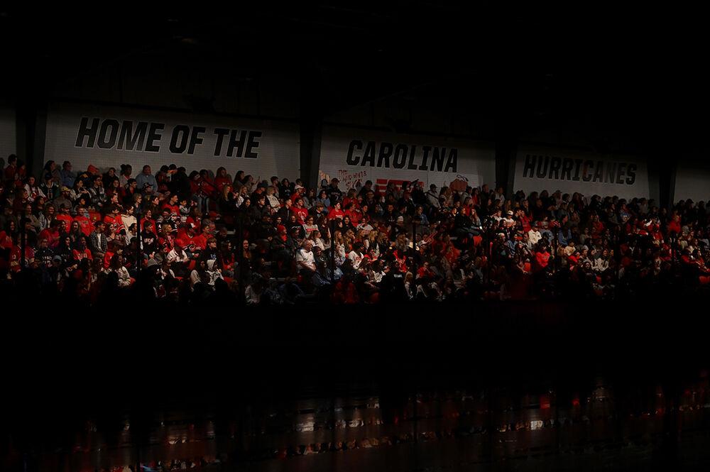 The crowd welcomes players onto the ice before the game against UNC-Chapel Hill at Invisalign Arena on Friday Oct. 11, 2024. The Wolfpack lost to the Tar Heels 6-5.