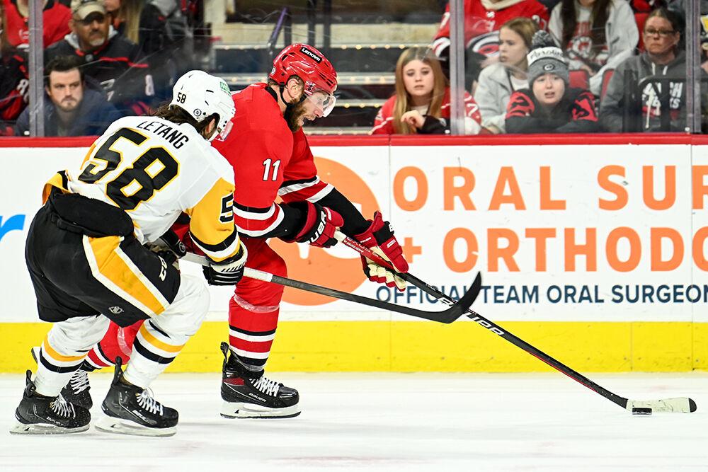Carolina Hurricanes center Jordan Staal moves the puck up the ice during the game against the Pittsburgh Penguins in PNC Arena on Saturday, Jan. 13, 2024. Staal attempted one shot on the goal. The Hurricanes beat the Penguins 3-2 in overtime.