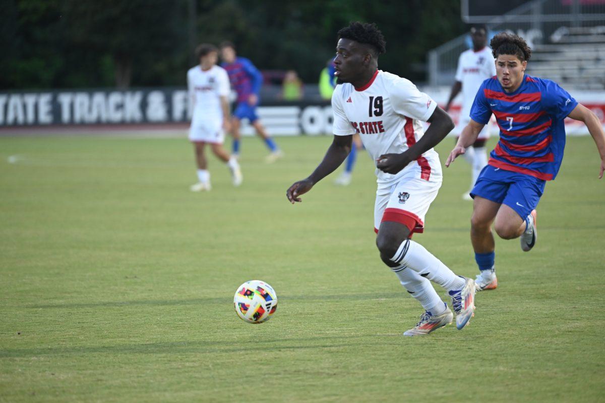 Senior defender Yves Tcheuyap dribbles the ball downfield at Dail Soccer Field on Saturday, Oct. 19, 2024. NC State beat SMU 5-1.
