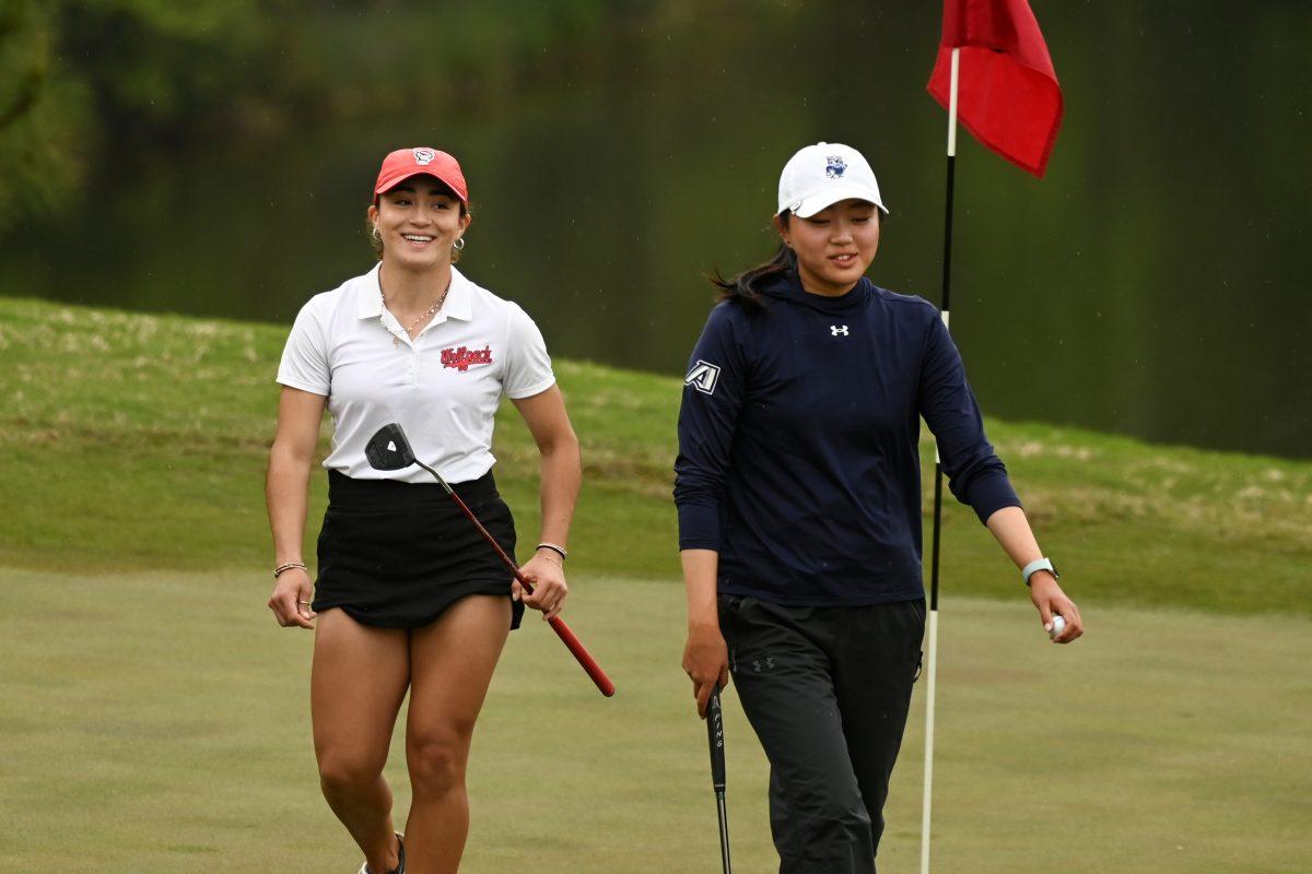 Junior Lauren Olivares Leon celebrates after completing 18 rounds during the Wolfpack Match Play at Lonnie Poole Golf Course on Tuesday, April 9, 2024. The Wolfpack finished sixth overall in its final regular season stitch.