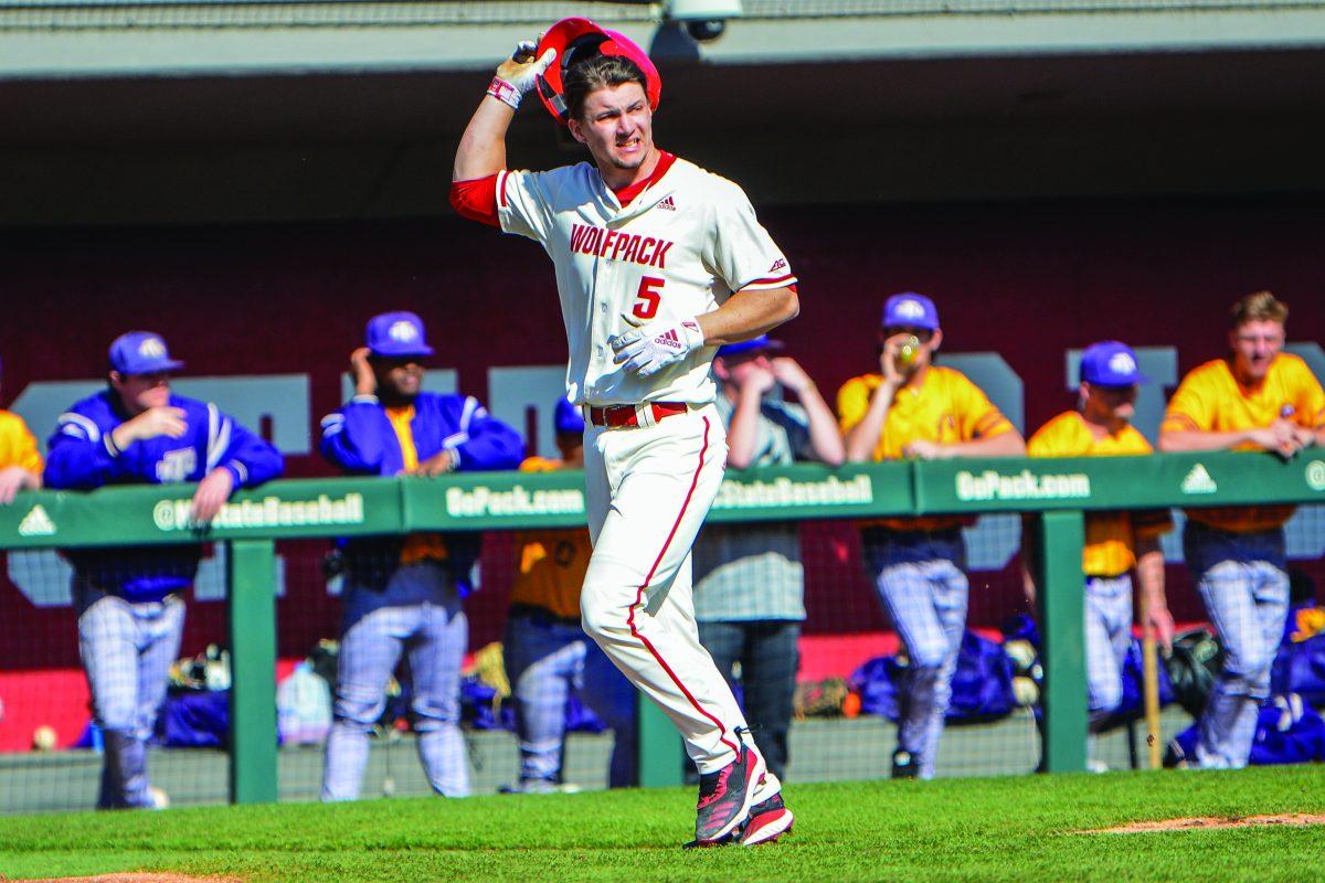 Junior catcher Patrick Bailey walks to home plate after another player hit a home run against Tennessee Tech in Doak Field at Dail Park on Sunday, Feb. 23, 2020. Bailey had two runs during the game.