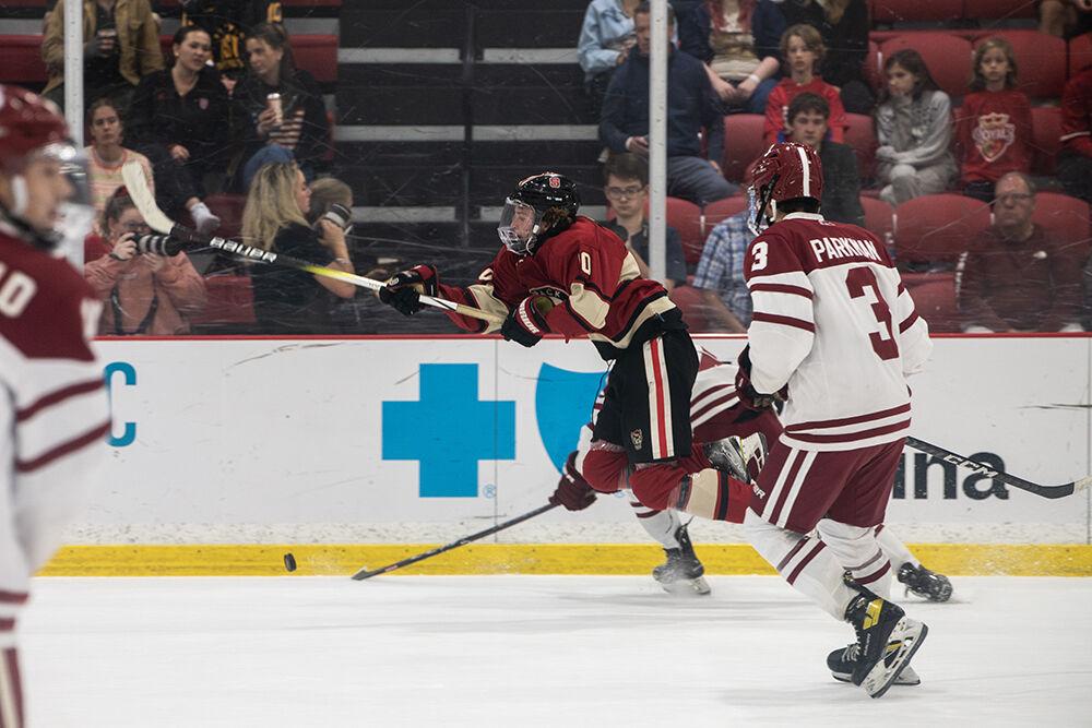 Freshman right winger Brayden Strong jumps after the puck during match against Alabama at Invisalign Arena on Saturday, Oct. 5, 2024. The Wolfpack defeated the Crimson Tide 5-2.