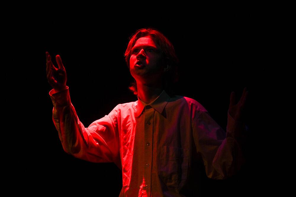 Tanner Moore, a first-year studying animal science, delivers a monologue to the audience during the dress rehearsal of "Teletype" in Kennedy-McIlwee Studio Theater on Wednesday, Oct. 2, 2024. "Teletype" was written by Wyat Hamilton, a fourth-year majoring in civil engineering.