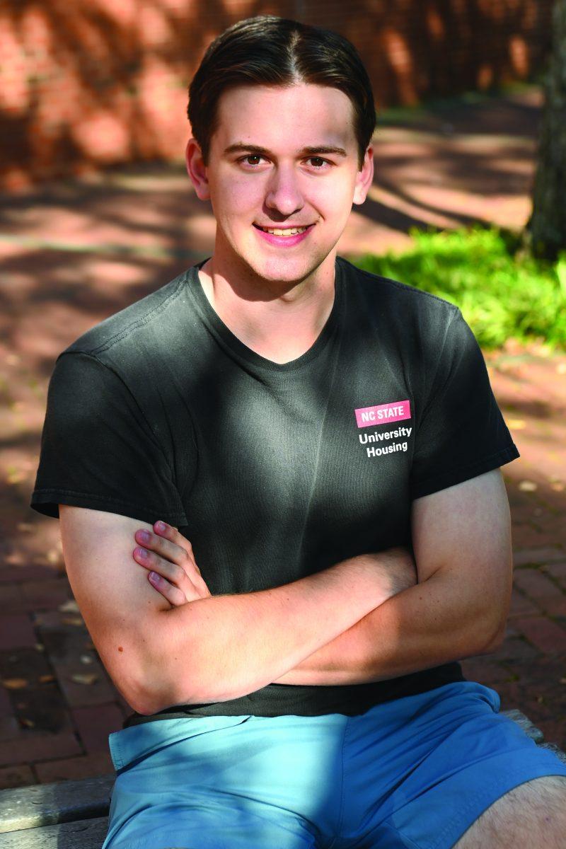 Brian Carss, a graduate student studying communications, sits for a portrait outside of Winston Hall on Monday, Oct. 7, 2024. Brian was interviewed as a part of Technician&#8217;s &#8220;Portraits of the Pack&#8221; series, in which students were asked questions regarding their political views.&#160;