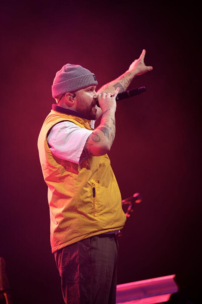 Quinn XCII sings during his concert at Red Hat Amphitheater on Friday, Oct. 25, 2024. Quinn XCII performed in Raleigh as the second to last stop of his "All You Can Eat" tour.