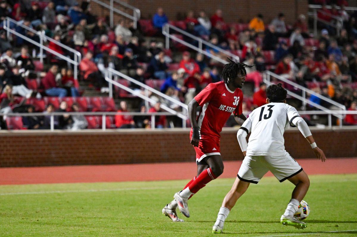 Sophomore forward Donavan Phillip looks to center the ball during the game against Louisville at Dail Soccer Field on Sunday, Oct. 27, 2024. NC State defeated Louisville 1-0.
