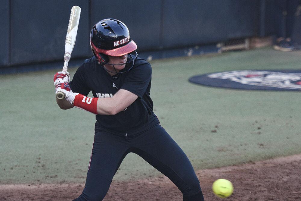 Junior outfielder Ellie Goins hits the ball during the game&#160;against Elon at Dail Softball Stadium on Wednesday, Oct. 23, 2024. The Wolfpack won the game 14-7.