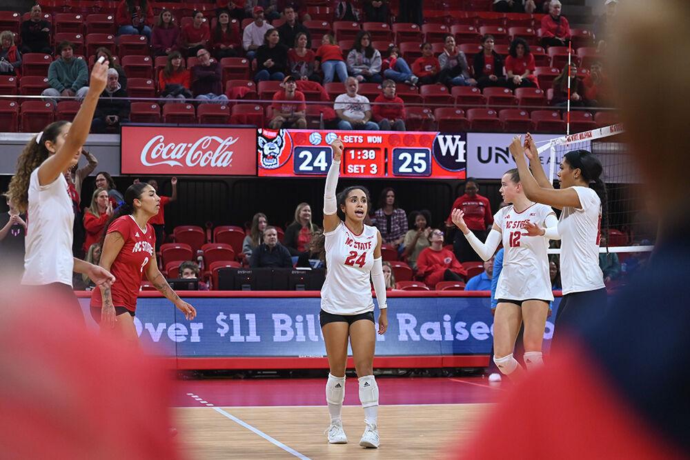 Junior libero Sydney Daniels and her teammates call for a touch during the match against Wake Forest in Reynolds Coliseum on Wednesday, Nov. 13, 2024. Daniels made five digs. The Wolfpack defeated the Demon Deacons 3-0.