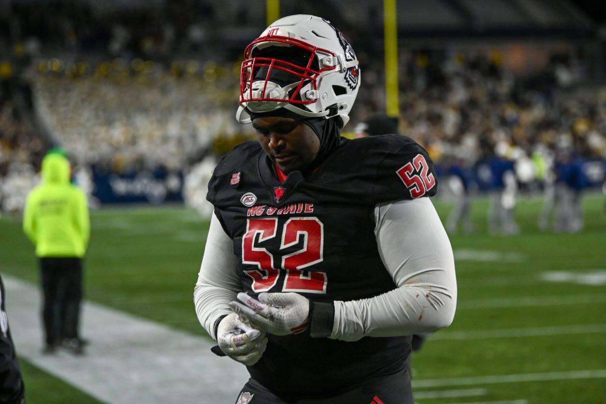 Graduate offensive tackle/guard Timothy McKay exits the field after the game against Georgia Tech in Bobby Dodd Stadium at Hundai Field in Atlanta on Thursday, Nov. 21, 2024. NC State lost to Georgia Tech 30-29.