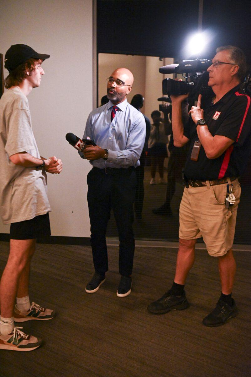 Beck Whitehead, a second-year studying political science and co-president of NCSU democrats interviews with CBS 17 at the NCSU Democrats election night watch party in Talley Student Union on Tuesday, Nov. 5. 2024. This event was hosted by NCSU democrats to disscuss the election results as they unfolded.