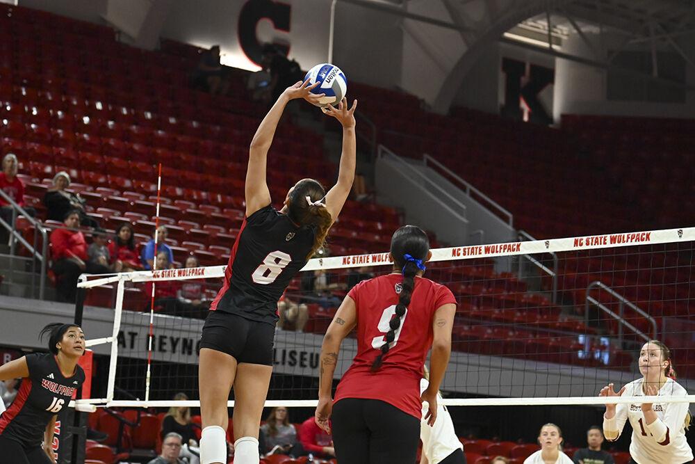 Senior middle blocker Jada Allen, graduate setter Naomi Cabello, and graduate defensive-specialist and libero Skye Stokes prepare to attack the ball during the match against Boston College in Reynolds Coliseum on Sunday, Nov. 3, 2024. Allen, Cabello, and Stokes combined for 13 attacks during the match. NC State lost to Boston College 3-0.