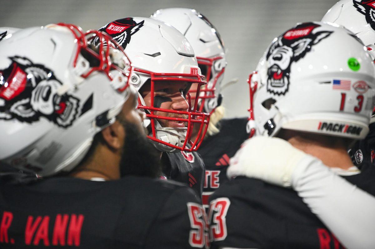 Graduate offensive lineman Zeke Correll gives a pregame talk to teammates before the game against Georgia Tech in Bobby Dodd Stadium at Hundai Field in Atlanta on Thursday, Nov. 21, 2024. NC State lost to Georgia Tech 30-29.