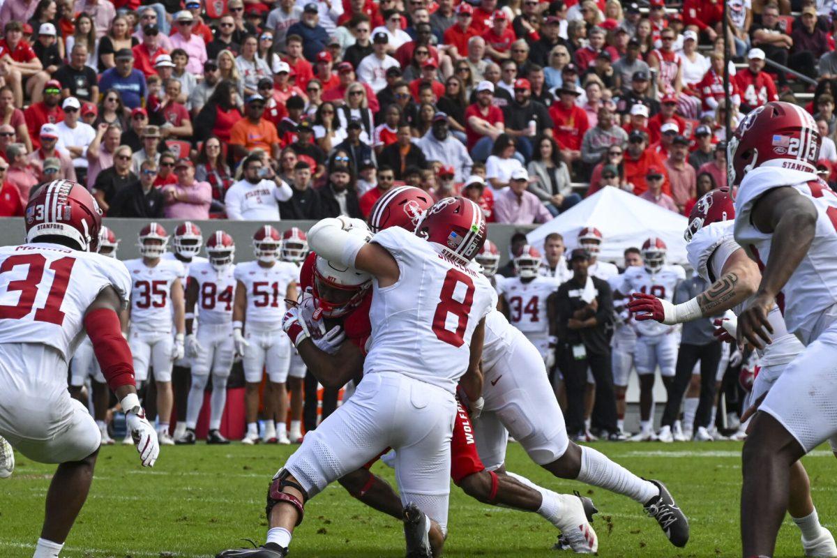 Sophomore wide receiver KC Concepcion runs the ball through opposing defense during the game against Stanford at Carter-Finley Stadium on Saturday, Nov. 2, 2024. Concepcion scored one receiving touchdown. NC State beat Stanford 59-28.