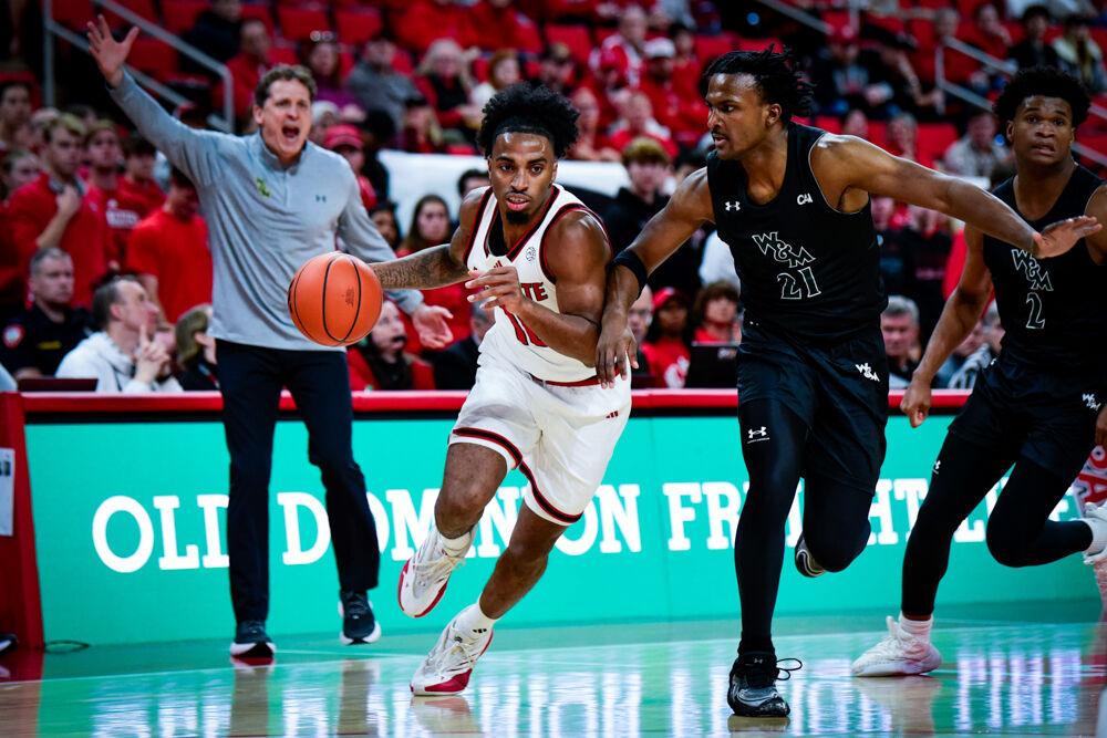 Graduate guard Marcus Hill drives to the basket during the game against William &amp; Mary in Lenovo Center on Friday, Nov. 22, 2024. Hill scored 19 points. The Wolfpack defeated the Tribe 81-58.