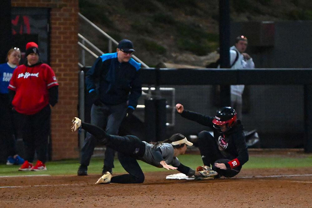 Junior outfielder Ellie Goins slides safely into third during the Wolfpack's fall game against Barton College at Dail Softball Stadium on Friday, Nov. 15, 2024. Since this was a fall game, no score was kept.