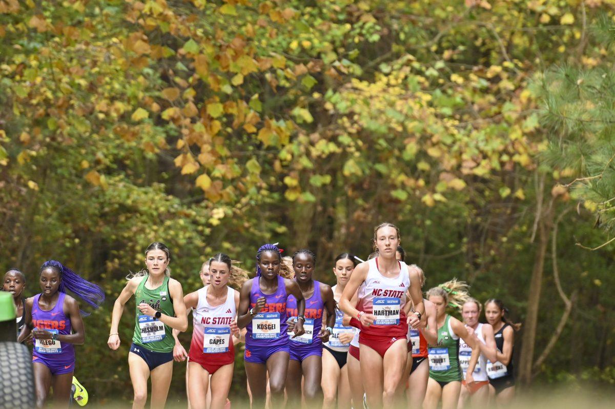 Junior runners Hannah Gapes and Grace Hartman leads the pack during the Cross Country ACC Championship at WakeMed Soccer Park on Friday, Nov. 1, 2024. The NC State women's team finished in fifth place.