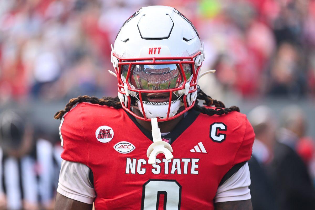 Redshirt junior linebacker Sean Brown walks out for the coin toss as a captain prior to NC State's game against Stanford in Carter-Finley Stadium on Saturday, Nov. 2, 2024. The Wolfpack beat the Cardinal 59-28.