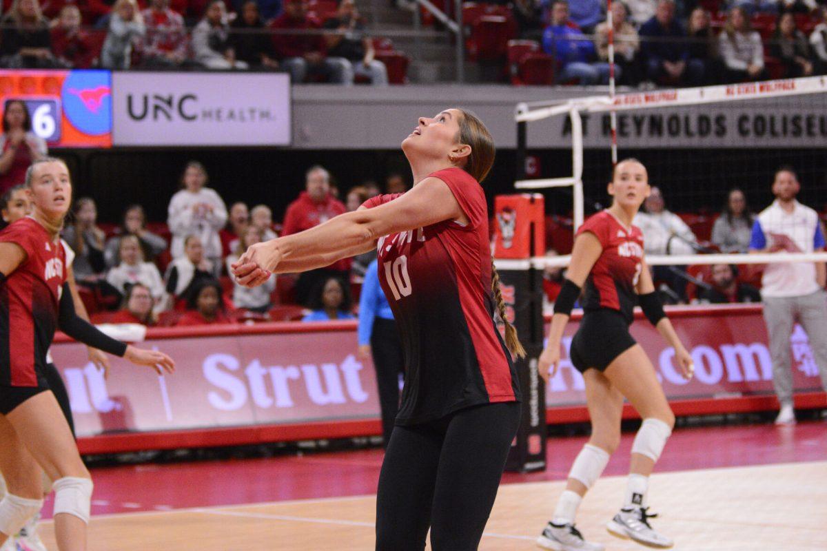 Freshman setter Kate Peterson prepares to pass the ball during the match against SMU at Reynolds Coliseum on Friday, Nov. 22, 2024. Peterson had eight digs and 13 assists. The Wolfpack lost to the Mustangs 3-2.