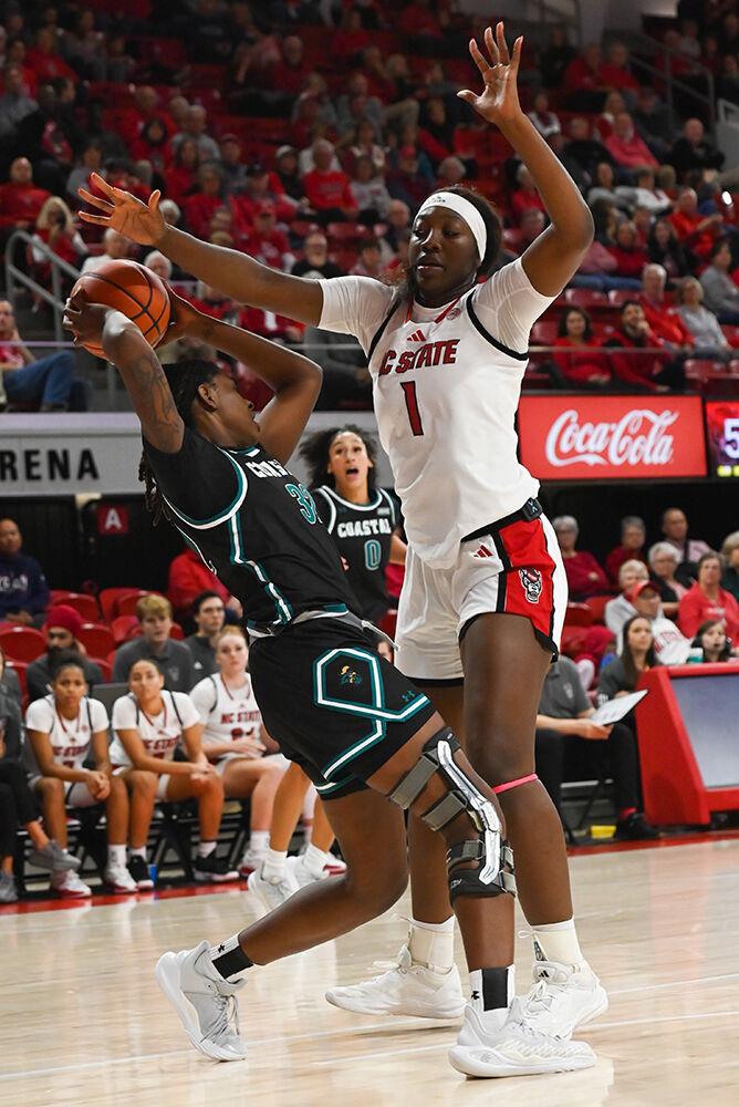 Freshman center Lorena Awou guards an opponent during the game against Coastal Carolina in Reynolds Coliseum on Thursday, Nov. 21, 2024. NC State beat Coastal Carolina 89-68.