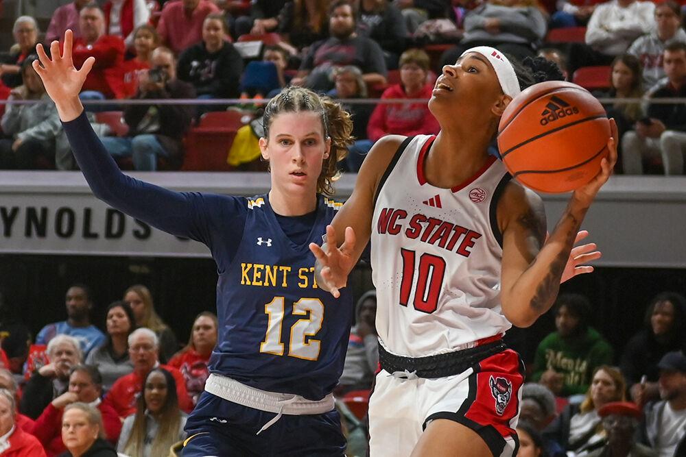 Senior guard Aziaha James prepares to shoot the ball at the net in the game against Kent State in Reynolds Coliseum on Thursday, Nov. 14, 2024. James led the team in scoring, while also hitting 1,000 career points in the game. NC State beat Kent State 79-51.