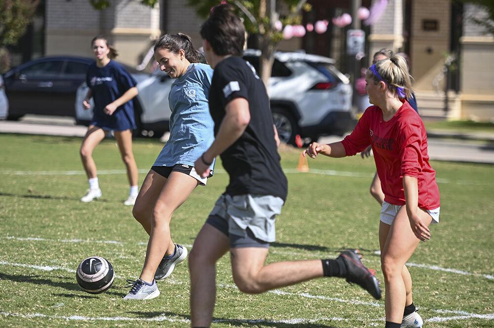 Amanda Campos, a third-year studying political science, keeps the ball away from the other team during the El Salvador Soccer Tournament at Stewardship Park on Saturday, Oct. 21, 2023. The tournament served as a fundraiser for Perseverancia, a nonprofit whose purpose is to leave a positive impact on the education system in Central America.