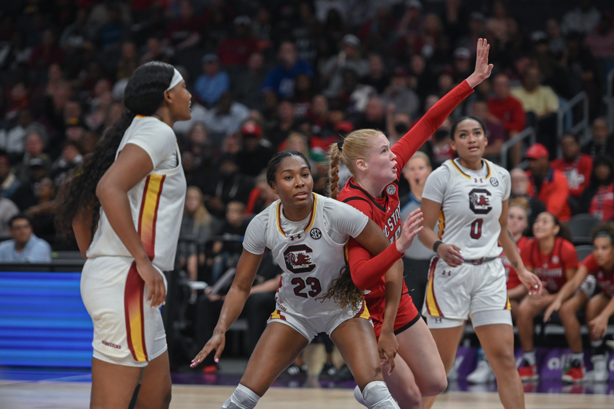 Freshman forward Tilda Trygger blocks South Carolina guard, Bree Hall during the Ally Tipoff at the Spectrum Center on Sunday, Nov. 10, 2024. NC State lost to South Carolina 71-57.