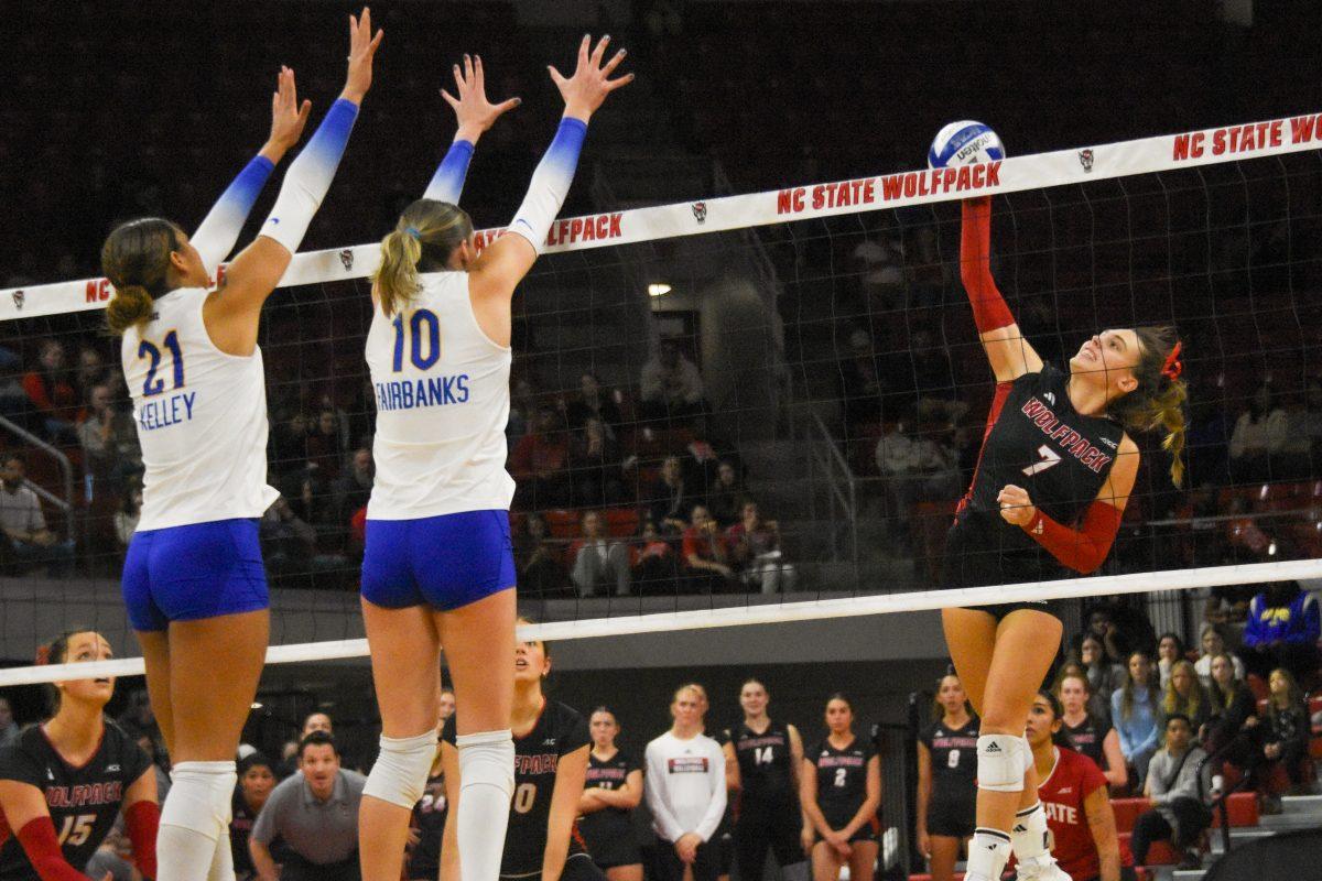 Junior outside hitter Ava Brizard hits the ball during the match against Pitt in Reynolds Coliseum on Sunday, Nov. 24, 2024. Brizard had five points. The Wolfpack fell to the Panthers 3-0.