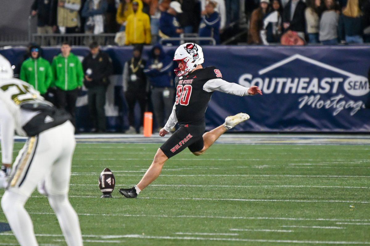 Graduate placekicker Collin Smith kicks the ball during the game against Georgia Tech in Bobby Dodd Stadium at Hundai Field in Atlanta on Thursday, Nov. 21, 2024. Smith missed his only field goal attempt of the night which would have won the game for NC State. NC State lost to Georgia Tech 30-29.