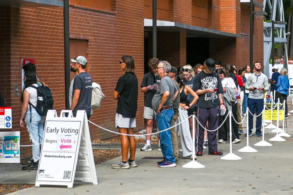 Voters line up outside during Early Voting at Talley Student Union Oct. 30. Talley Student Union was one of Wake county's early voting sites during this election cycle.