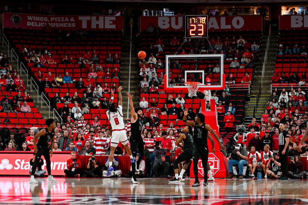 Senior guard Jayden Taylor shoots a 3-pointer during the game against William &amp; Mary in the Lenovo Center on Friday, Nov. 22, 2024. NC State beat William &amp; Mary 84-61.