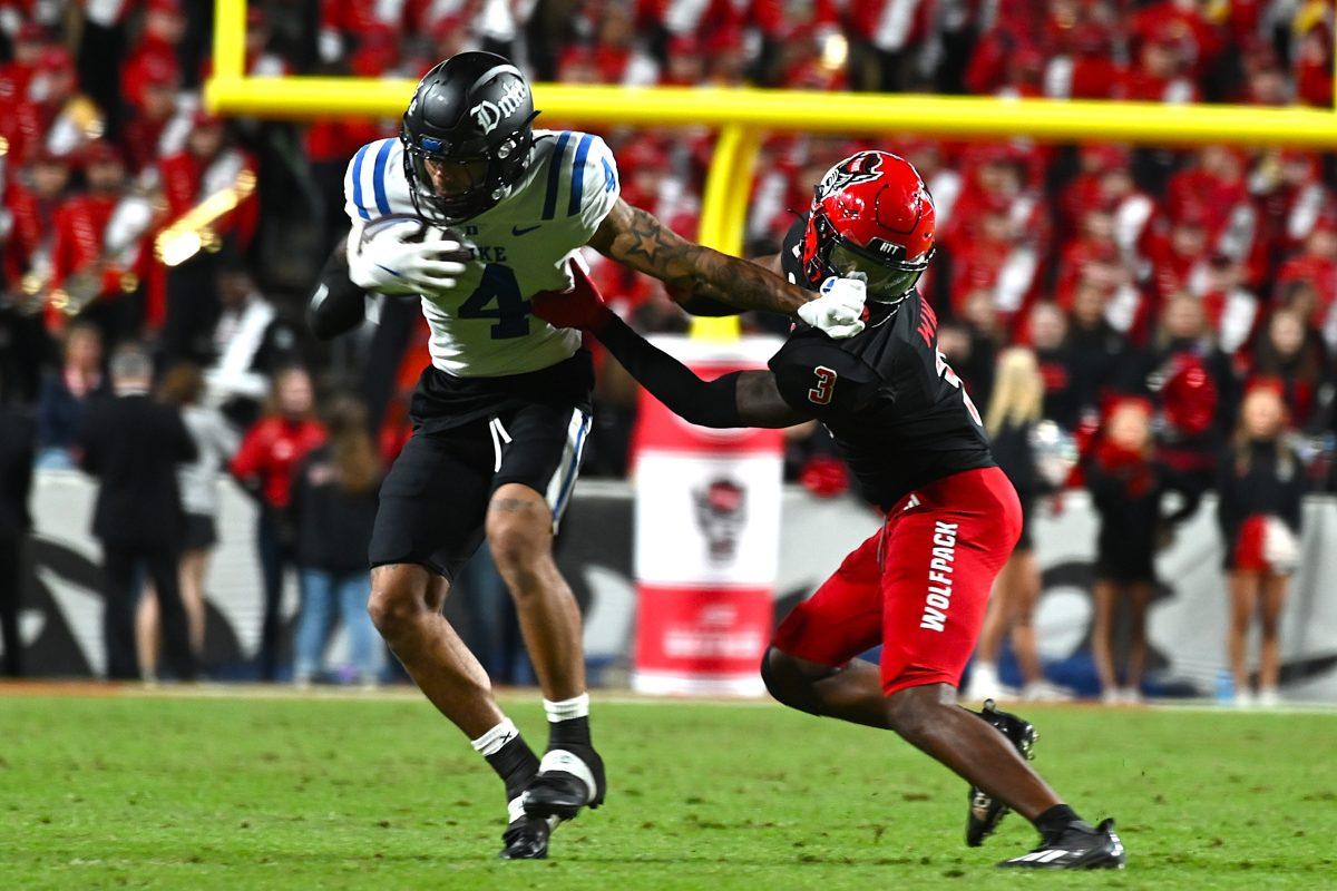 Graduate cornerback Aydan White tries to make a tackle during the football game against Duke at Carter-Finley Stadium on Saturday, Nov. 9, 2024. The Wolfpack lost to the Devils 29-19.