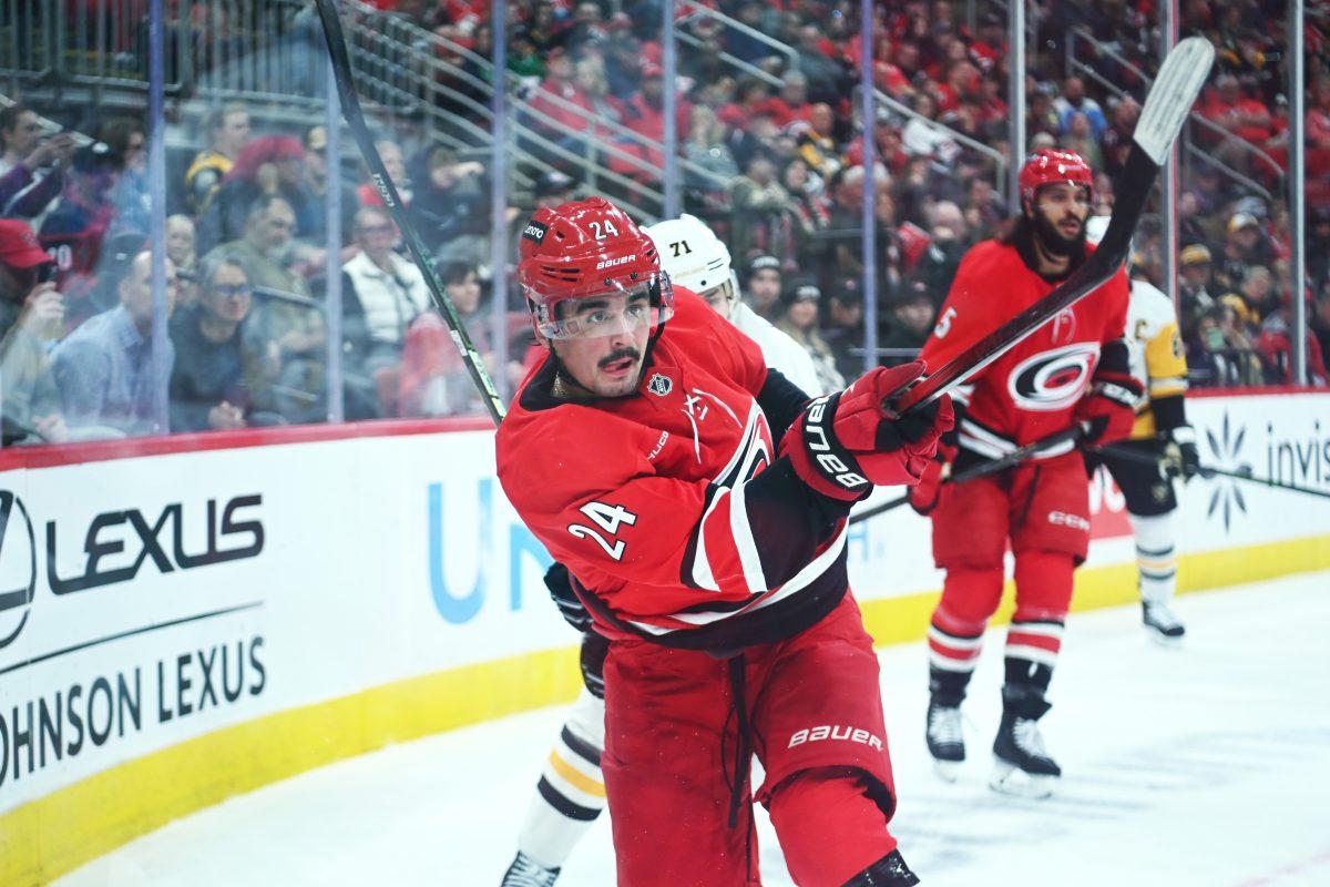 Center Seth Jarvis passes the puck during the game versus the Pittsburgh Penguins at Lenovo Center on Thursday, Nov. 7, 2024. The Hurricanes beat the Penguins 5-1.