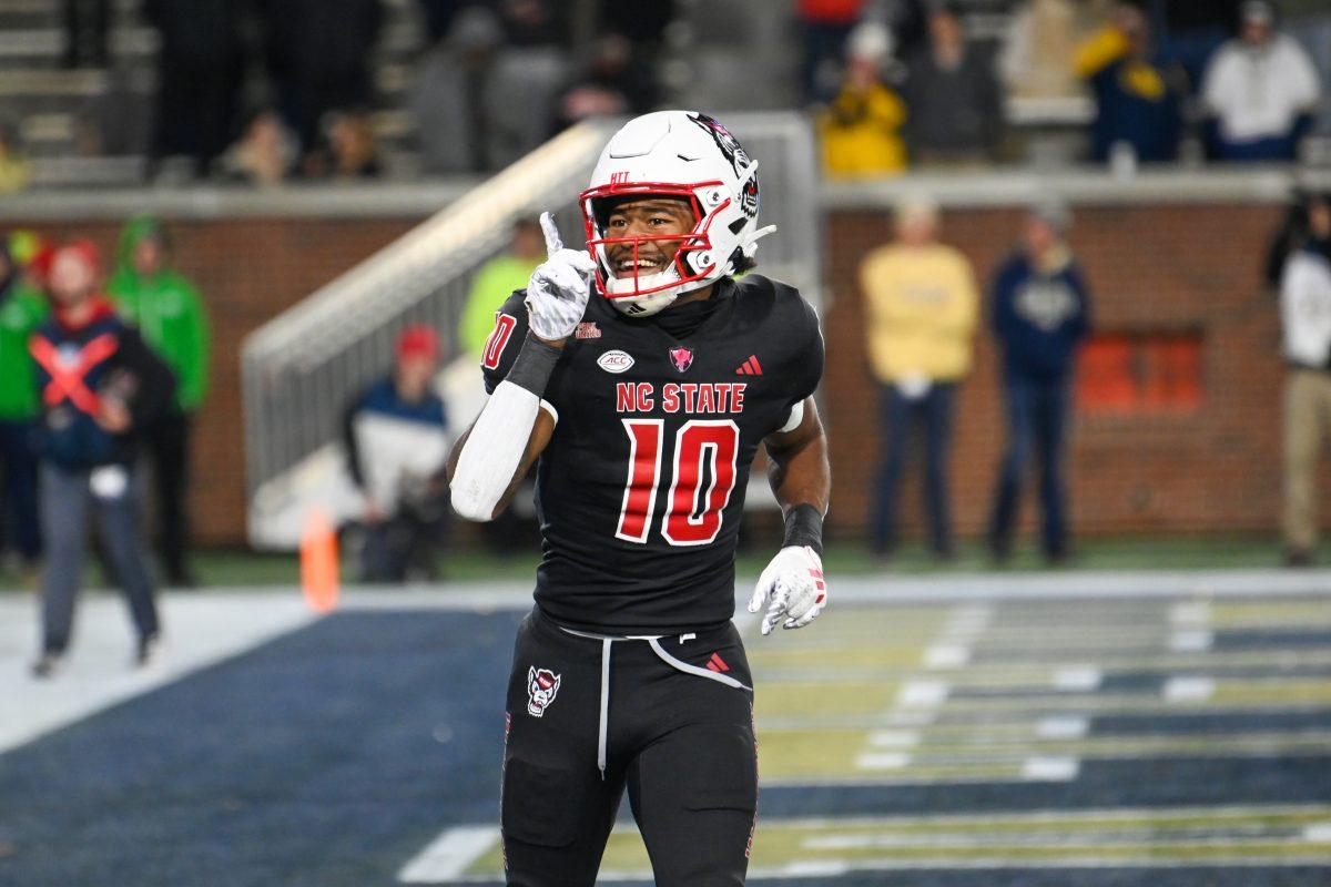 Sophomore wide receiver KC Concepcion shushes the crowd during the game against Georgia Tech in Bobby Dodd Stadium at Hundai Field in Atlanta on Thursday, Nov. 21, 2024. Concepcion had three receptions for a total of 21 yards. NC State lost to Georgia Tech 30-29.