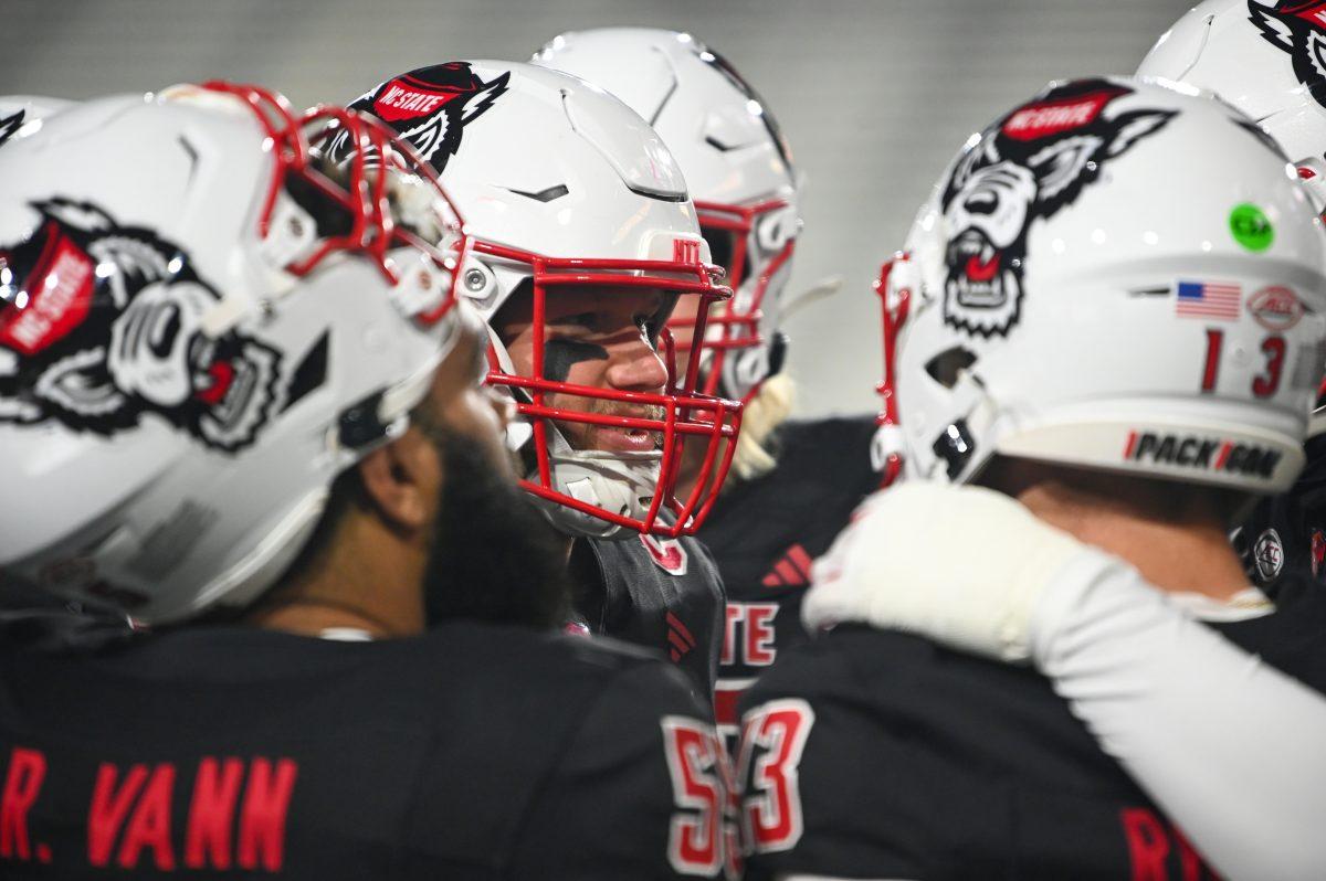 Graduate offensive lineman Zeke Correll gives a pregame talk to teammates before the game against Georgia Tech in Bobby Dodd Stadium at Hundai Field in Atlanta on Thursday, Nov. 21, 2024. NC State lost to Georgia Tech 30-29.