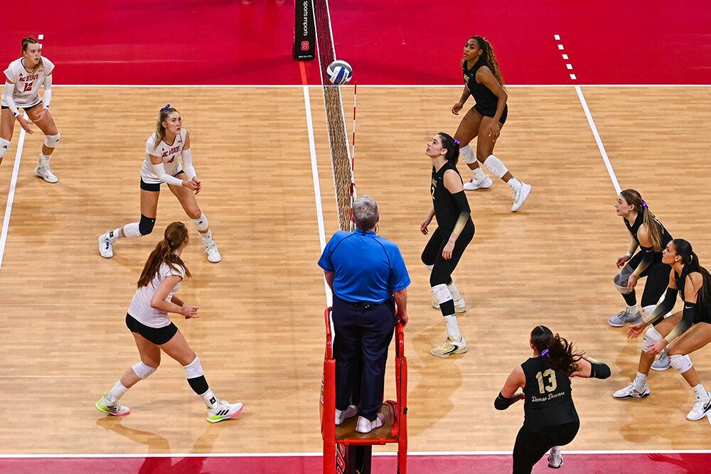 NC State battles against Wake Forest during the volleyball match in Reynolds Coliseum on Wednesday, Nov. 13, 2024. NC State won all three sets against Wake Forest.