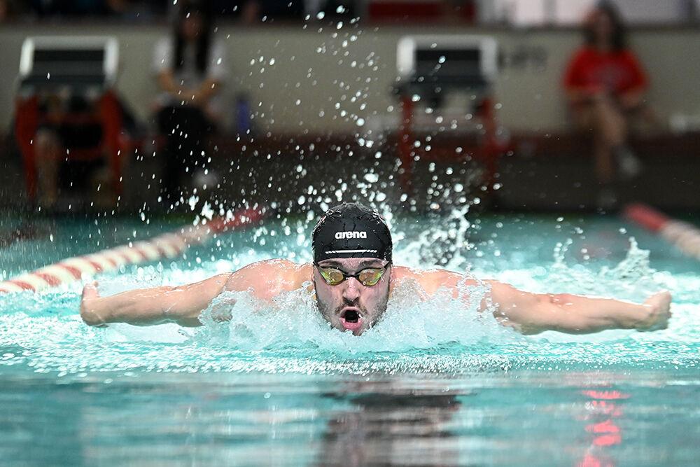 Sophomore Stephen Conrad swims the men 200-yard butterfly during the swimming and diving meet against UNC-Wilmington at Willis R. Casey Aquatic Center on Friday, Feb. 2, 2024. Conrad placed third in the heat with a time of 1:47.33. The NC State men's team beat Wilmington 172-104.