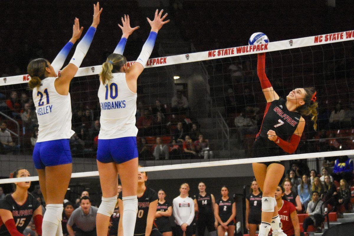 Junior outside hitter Ava Brizard hits the ball during the match against Pitt in Reynolds Coliseum on Sunday, Nov. 24, 2024. Brizard had five points. The Wolfpack fell to the Panthers 3-0.