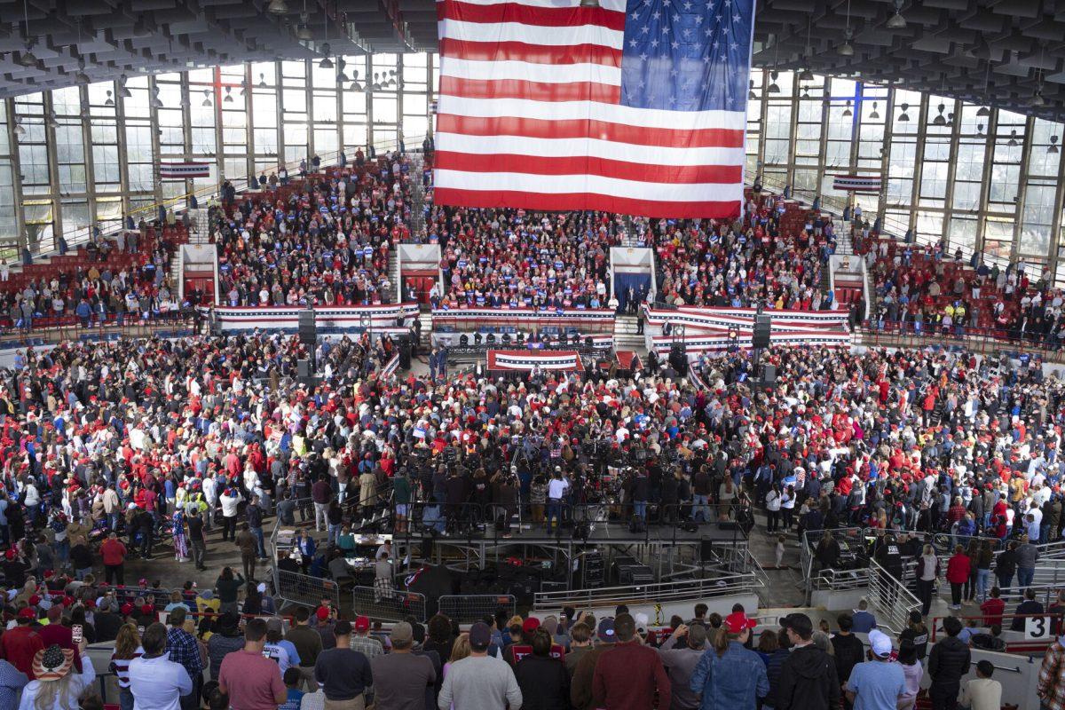 A crowd listens to former President Donald Trump at his rally at J.S. Dorton Arena on Monday, Nov. 4, 2024. People began gathering for the 10 a.m. speech as early as 4 a.m. Monday.