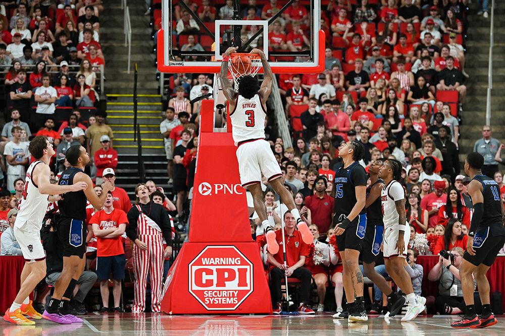 Senior guard Dontrez Styles dunks the ball into the basket during the game against Presbyterian at the Lenovo Center on Friday, Nov. 8, 2024. Styles had seven rebounds and scored nine points. NC State beat Presbyterian 81-72.