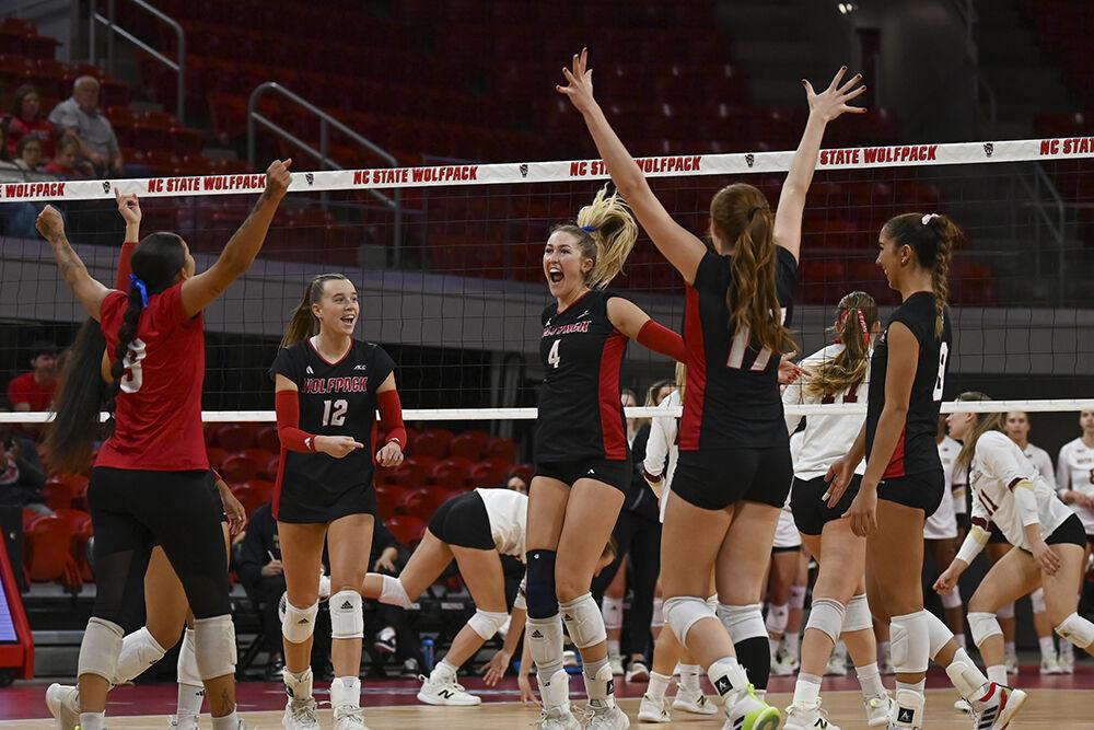 The NC State volleyball team celebrates a kill during the match against Boston College in Reynolds Coliseum on Sunday, Nov. 3, 2024. The team combined for 31 kills. NC State lost to Boston College 3-0.