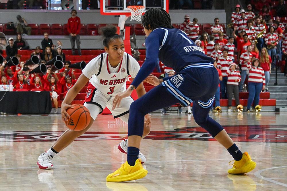 Freshman guard Zamareya Jones navigates around an opponent during the game against Old Dominion in Reynolds Coliseum on Sunday, Dec. 8, 2024. Jones scored 15 points, on top of making four rebounds and three blocks. NC State won the game 86-55.