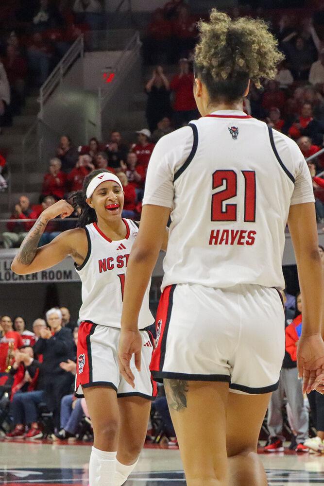Senior guard Azaiah James celebrates during the game against Davidson College on Wednesday, Dec. 11, 2024. James recorded 21 points and eight rebounds. NC State won 59-57.