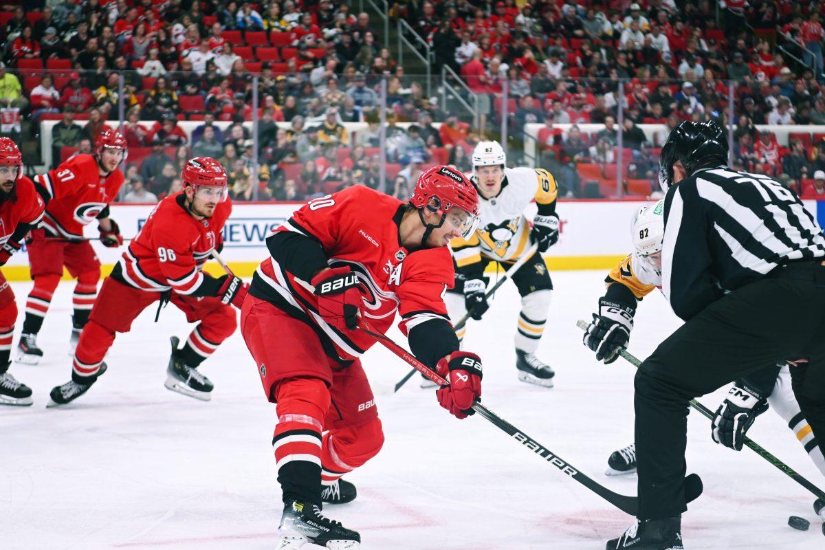 Center Sebastian Aho battles for the puck during the game versus the Pittsburgh Penguins at Lenovo Center on Thursday, Nov. 7, 2024. The Hurricanes beat the Penguins 5-1.