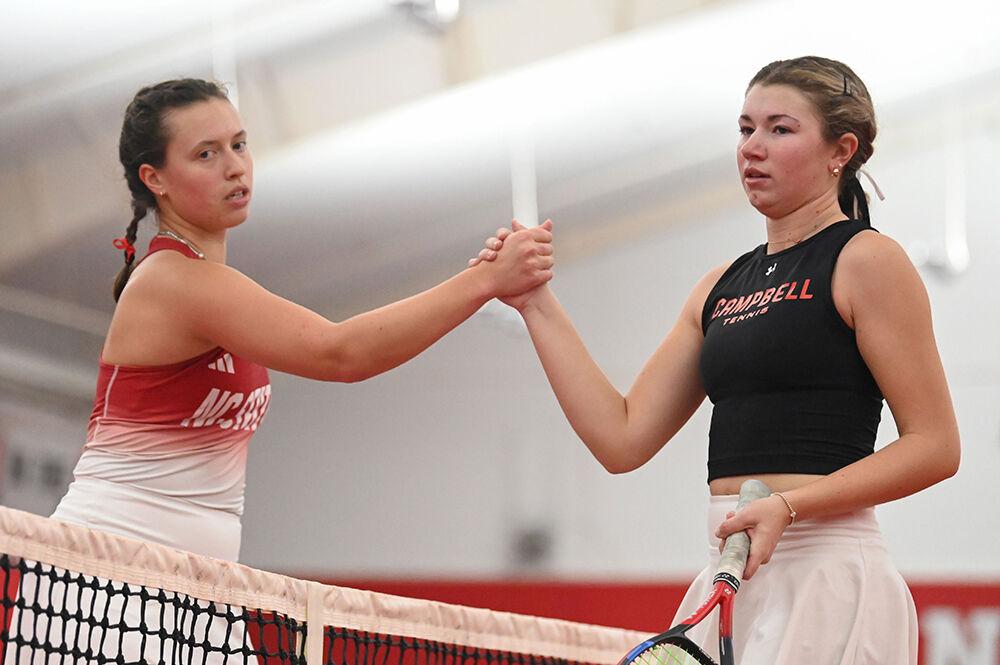 Junior Anna Zyryanova shakes hands with her opponent during the match against Campbell at the J.W. Isenhour Tennis Center on Friday, Jan. 17, 2025. Zyryanova won her singles match 6-0, 6-1. NC State beat Campbell 7-0.