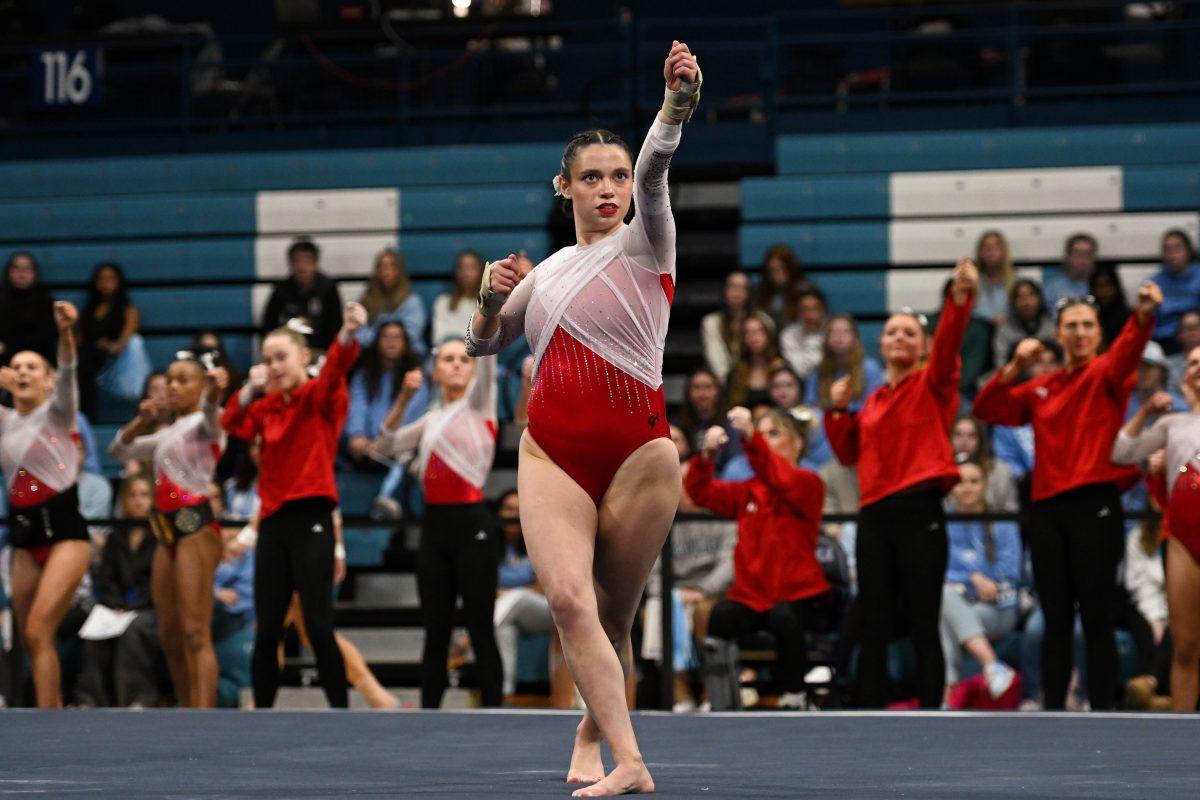 Graduate student Chloe Negrete poses during her floor routine during the meet against UNC-Chapel Hill in Carmichael Arena on Friday, Jan. 24, 2025. Negrete earned a 9.925 on her floor routine. The Wolfpack beat the Tar Heels 196.350-195.925.
