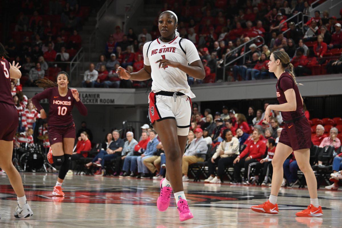 Freshman center Lorena Awou drives toward the basket during the match against Virginia Tech in Reynolds Coliseum on Sunday, Jan. 26, 2025. Awou had two rebounds and one steal. The Wolfpack beat the Hokies 85-57.